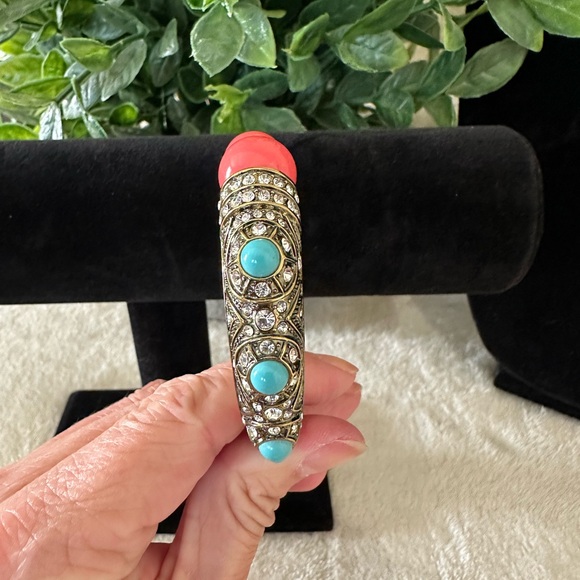 Heidi Daus Coral and Turquoise Hinged Bangle on a Gold toned Backdrop - Picture 3 of 9